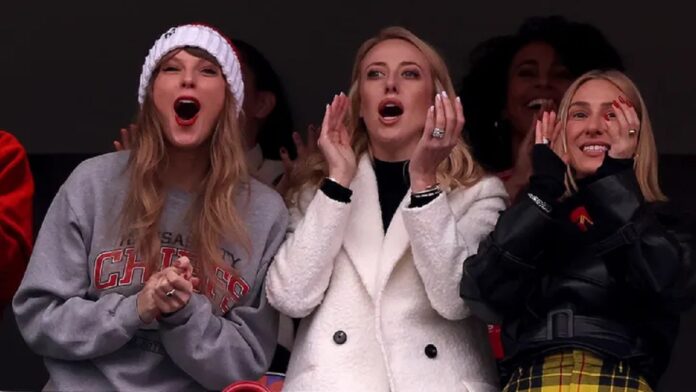 Exclusive : Taylor Swift blows Patriots fans an ironic kiss after being booed by them...