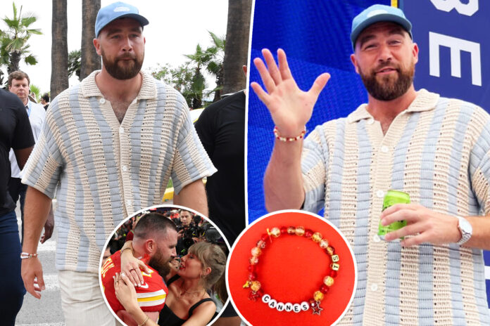 Travis Kelce wears a Fearless friendship bracelet at a Cannes Lions panel as he admits he's got 'more fans' thanks to girlfriend Taylor Swift's VERY dedicated following